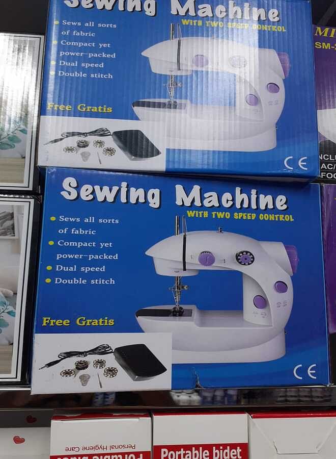 Portable Mini Electric Sewing Machine with 2 speed control White/Purple/Silver