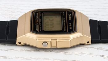 Casio Unisex Watch in Resin/Acrylic Glass with Date Display and LED Light - Water Resistance & Alarm Gold,F-91WM-9ADF