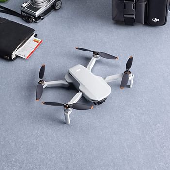 DJI Mini 2 - Ultralight and Foldable Drone Quadcopter, 3-Axis Gimbal with 4K Camera, 12MP Photo, 31 Minutes Flight Time, OcuSync 2.0 HD Video Transmission, Mavic Mini, QuickShots with DJI Fly App