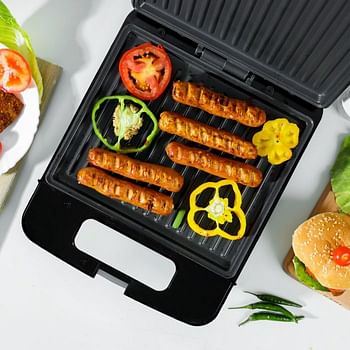 Geepas 1400 W 4-Slice Grill Maker- GGT671N/ Non-Stick Plates for Easy Release and Quick Cleanup/ Cool Touch Handle, Overheat Protection, Perfect for Grilled Sandwiches, Fit Any Type or Size of Food, Meat, Snack - Black